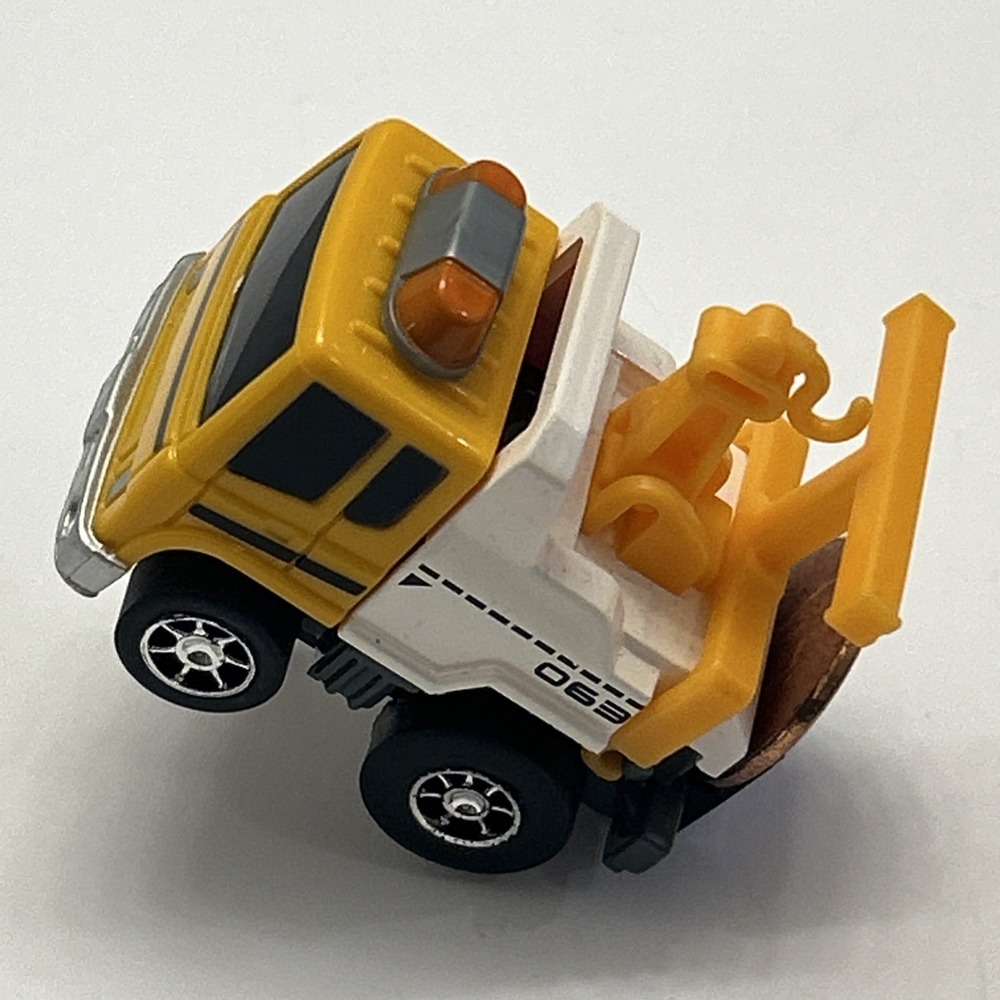 Vintage Silverlit Nano Autos No. 063 Tow Truck Yellow Micro Pull-Back Car